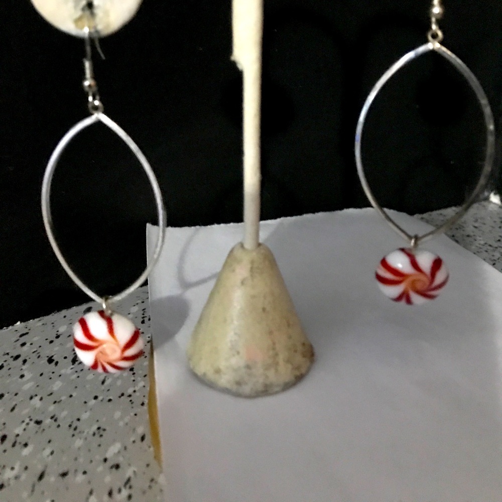 Peppermints beads dangle on oval hoops